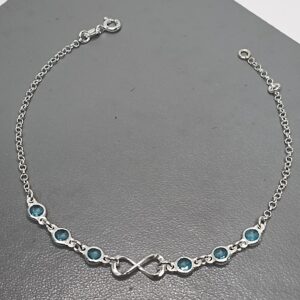 Pulseira De Prata 6 Zirconia Azul Claro Infinito Meio